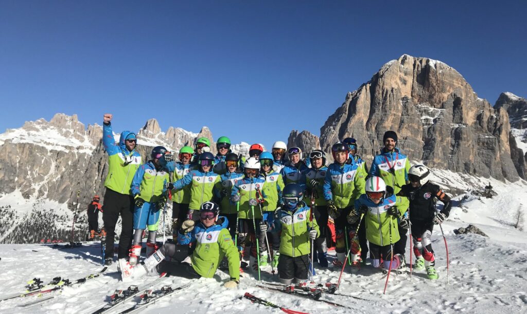 Alta Badia-Cortina-Aprica International Ski Academy racers standing together. 