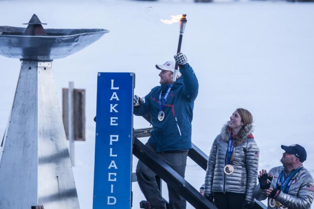 The Northwood School with New York Ski Education Foundation lights the torch at Lake Placid, New York. 